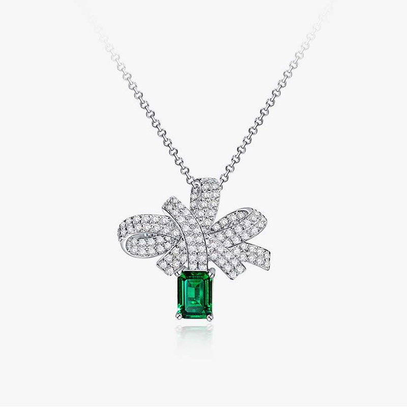 Helloice Micro Paved Bowknot with Green Emerald Cut Pendant in Sterling Silver