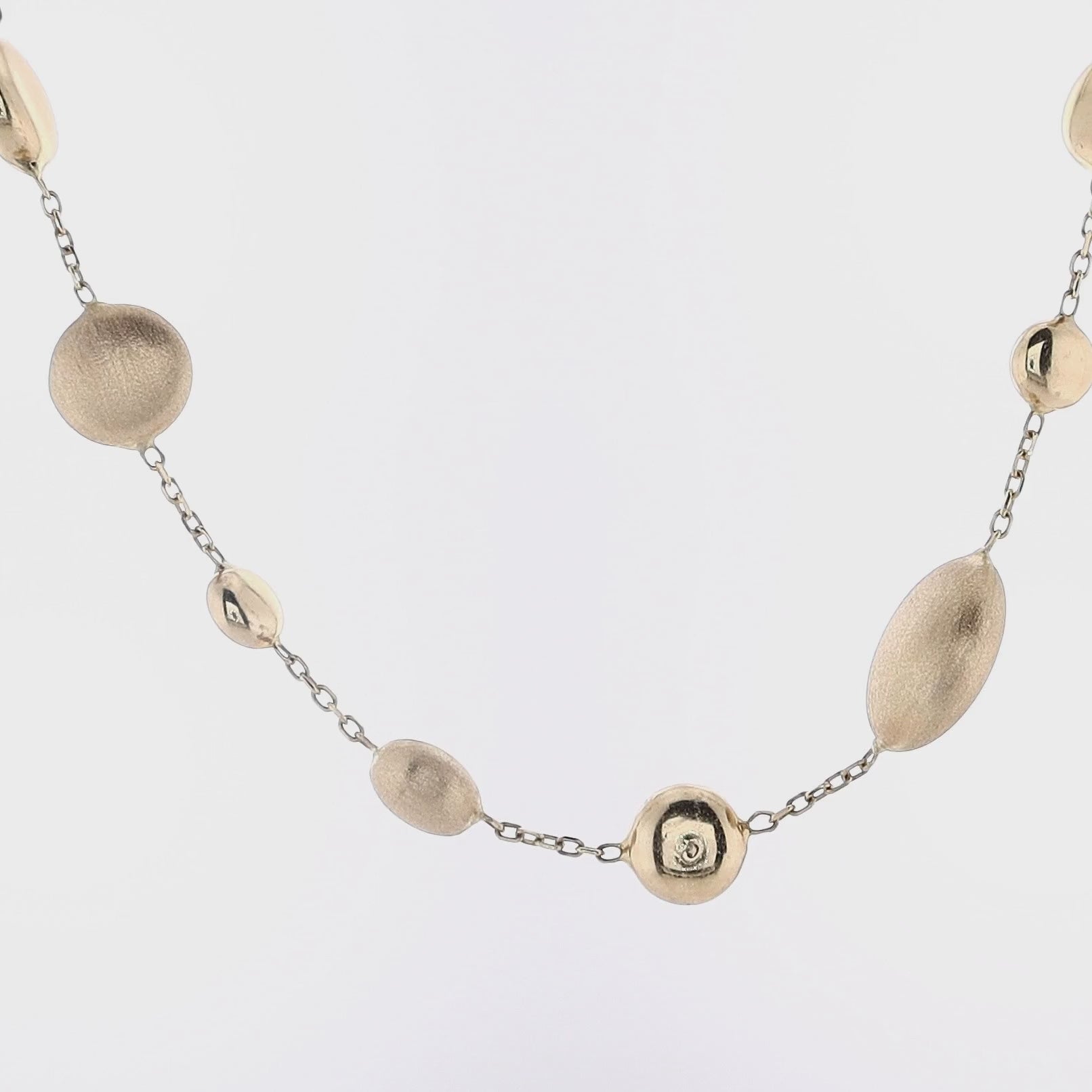 14 Karat Yellow Gold Assorted Round and Puff Matte and Polished Station Bead Necklace