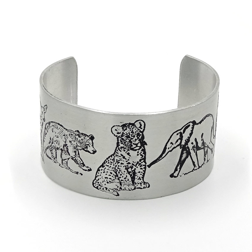 Vintage Stamped Animals Aluminum Cuff Bracelet