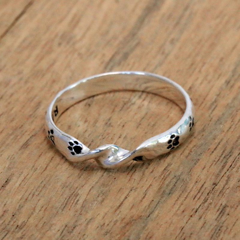 Sterling Silver Band Ring with Paw Print Motifs from Bali, "Animal Twist"