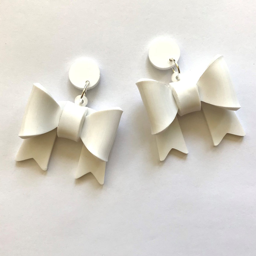 White Bow Dangles By Coup de Colere